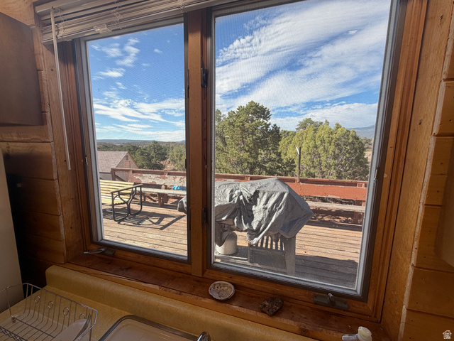 358 South Sky Drive Torrey, UT 84775 - Photo 21 of 82 Wood-framed window offering outdoor access to a large wood deck