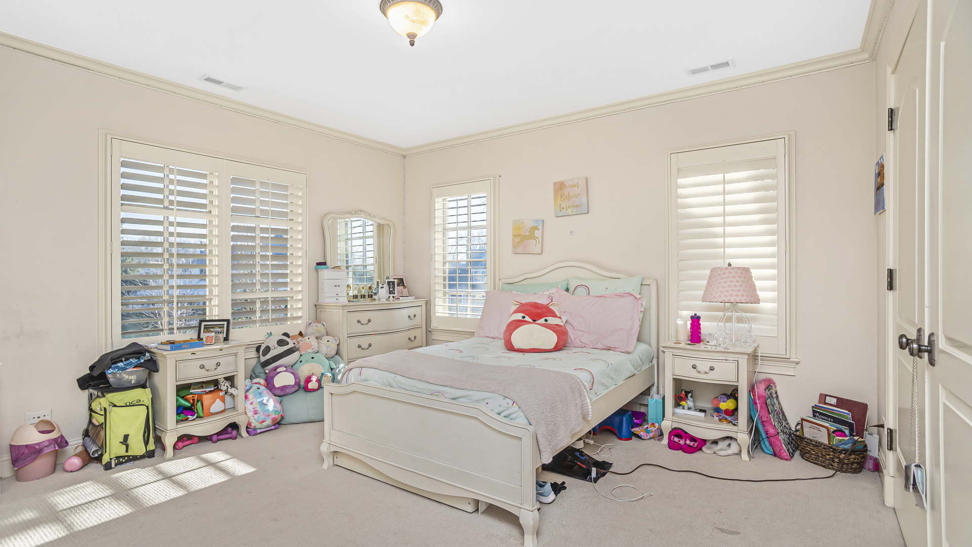 833 Chatham Road Glenview, IL 60025 - Photo 28 of 50 a bedroom with a bed and a window