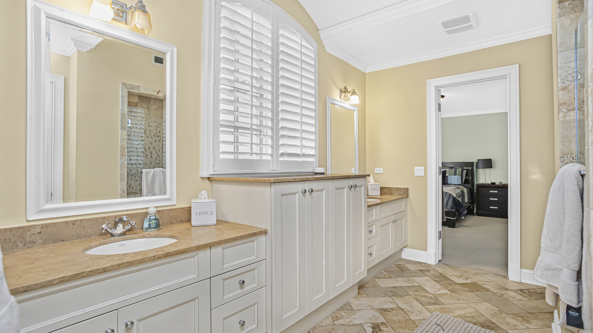 833 Chatham Road Glenview, IL 60025 - Photo 34 of 50 a bathroom with a granite countertop sink and a mirror