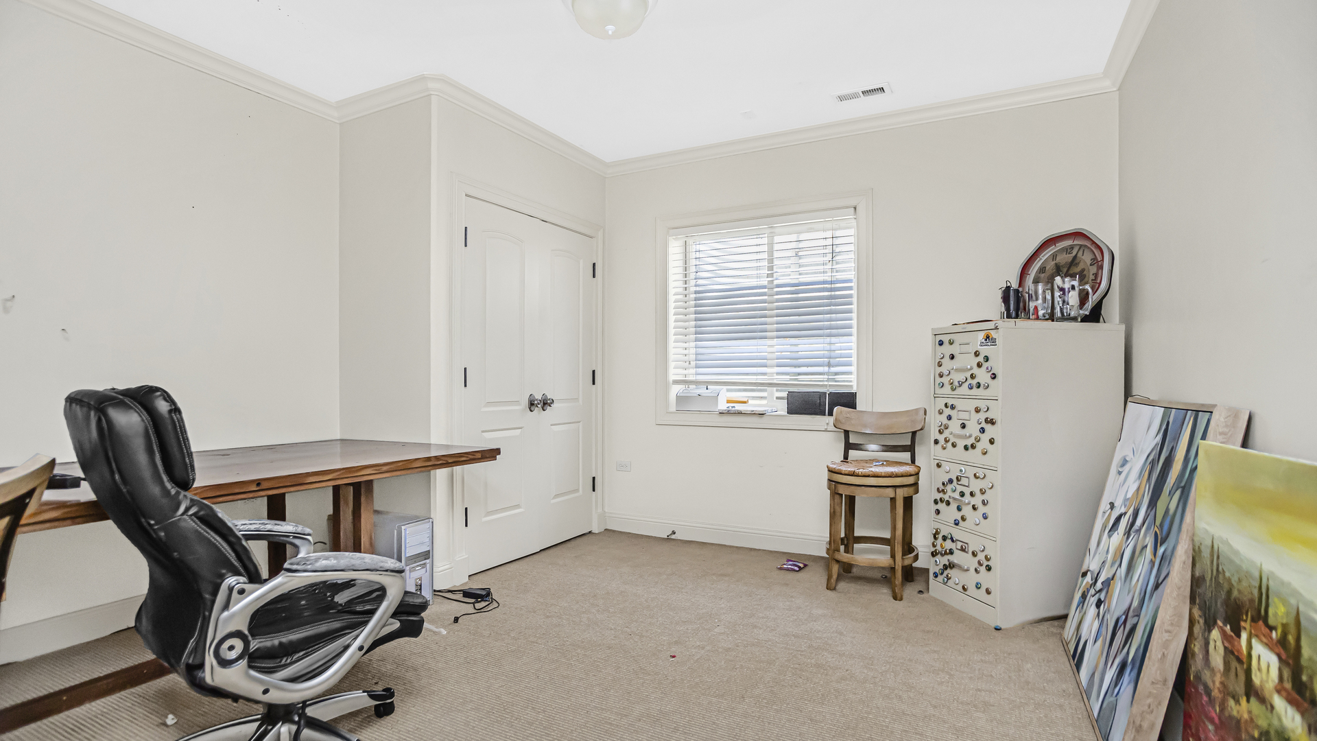 833 Chatham Road Glenview, IL 60025 - Photo 45 of 50 a view of a workspace with furniture and a window