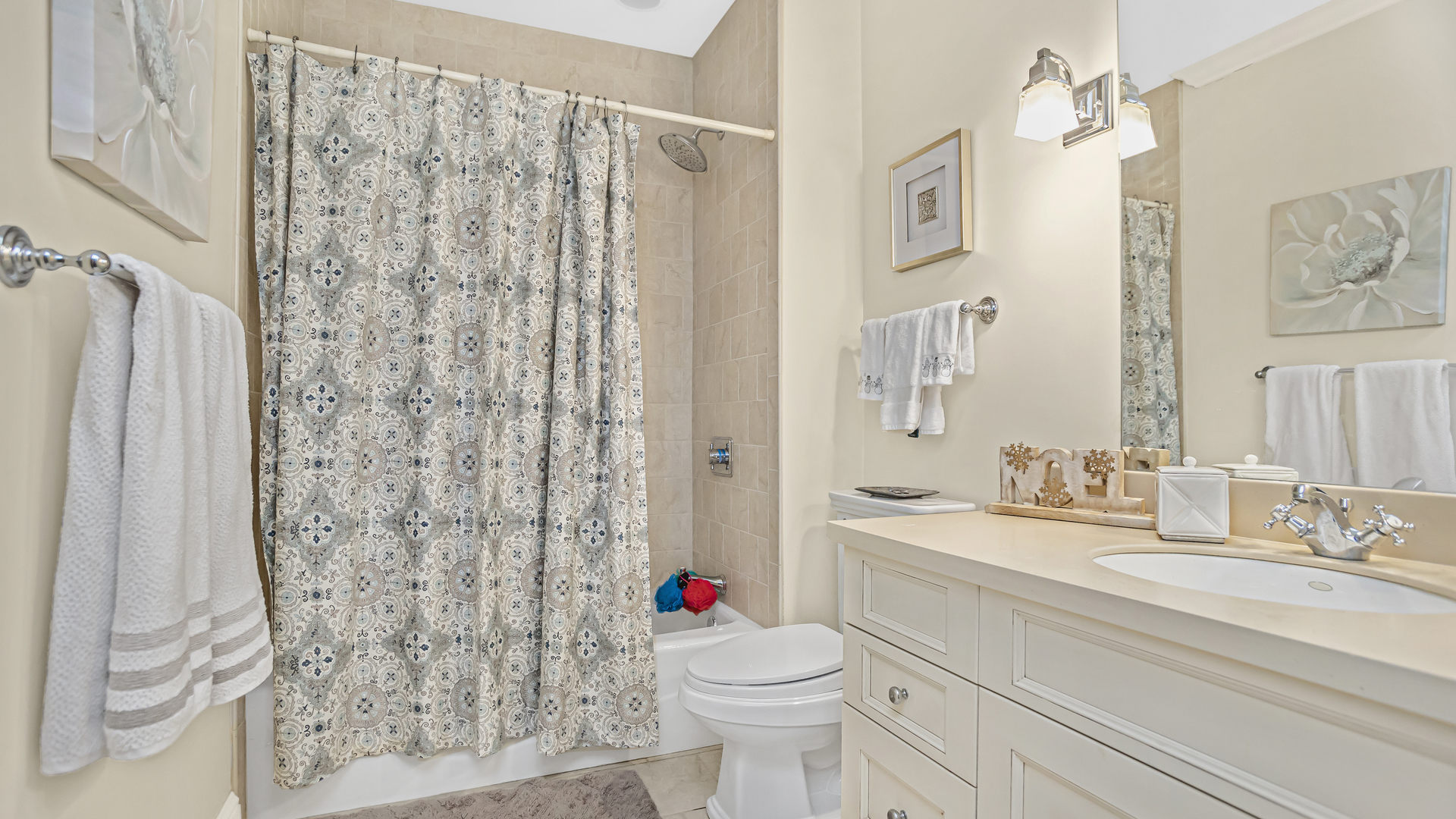 833 Chatham Road Glenview, IL 60025 - Photo 46 of 50 a bathroom with a sink toilet and shower