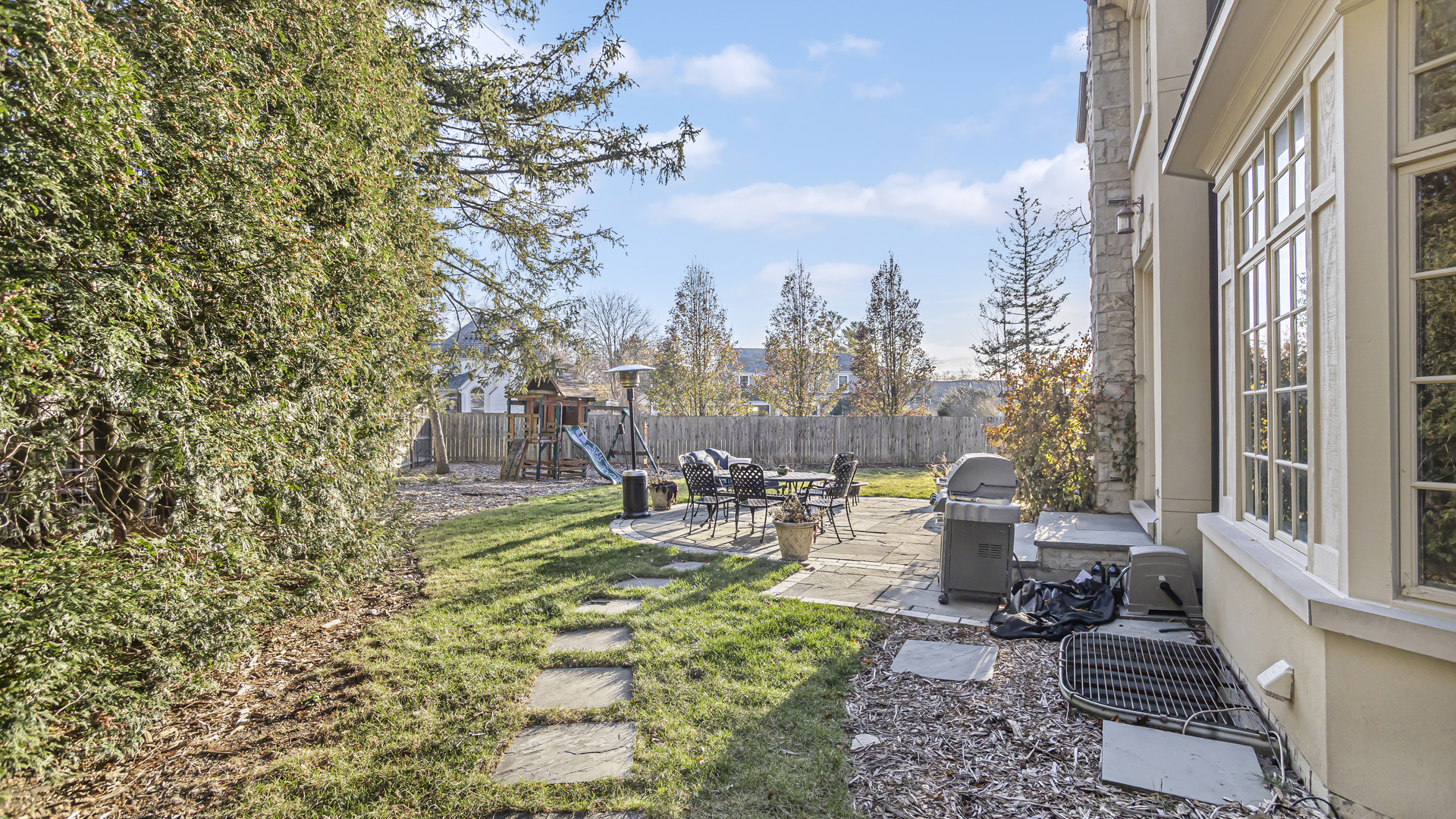 833 Chatham Road Glenview, IL 60025 - Photo 6 of 50 a view of a city with lawn chairs and a fire pit
