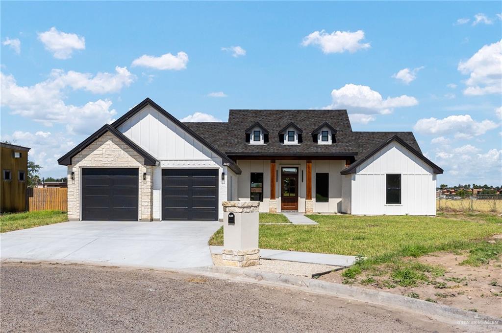 a front view of a house with yard