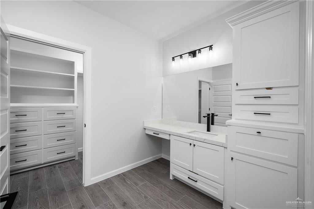 2443 Lady Palm Drive Rio Grande City, TX 78582 - Photo 10 of 19 a bathroom with a double vanity sink a mirror and a vanity