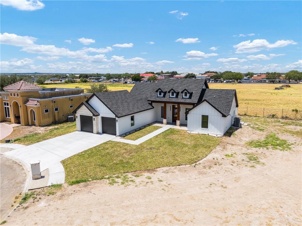 2443 Lady Palm Drive Rio Grande City, TX 78582 - Photo 2 of 19 a view of a house with a ocean view