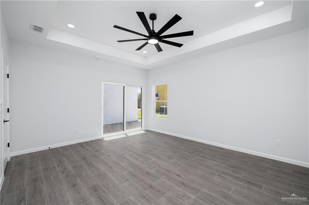 2443 Lady Palm Drive Rio Grande City, TX 78582 - Photo 9 of 19 an empty room with cabinet and ceiling fan