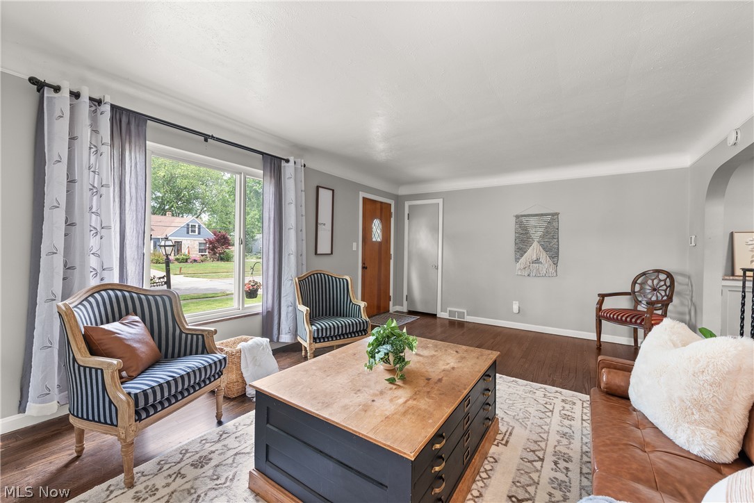 21779 Eaton Road Cleveland, OH 44126 - Photo 7 of 46 Living room featuring a wealth of natural light and hardwood / wood-style flooring