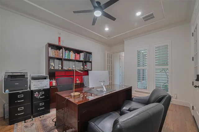 a view of a workspace with furniture