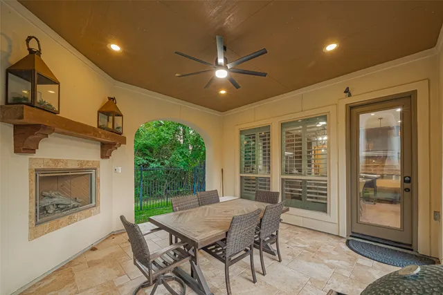 a dining room with furniture and window