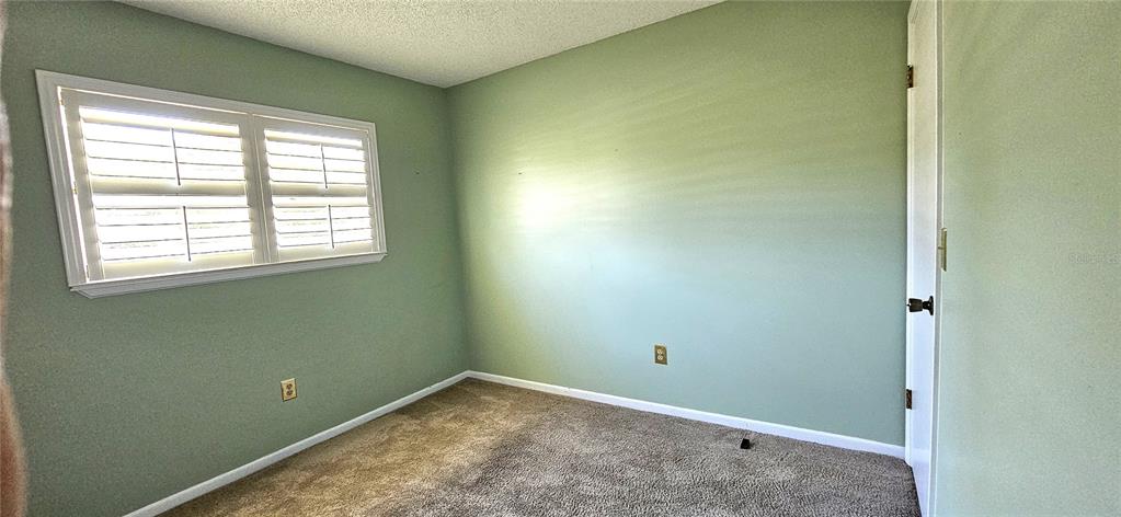 8274 Southwest 106th Place Ocala, FL 34481 - Photo 17 of 40 a view of empty room with window