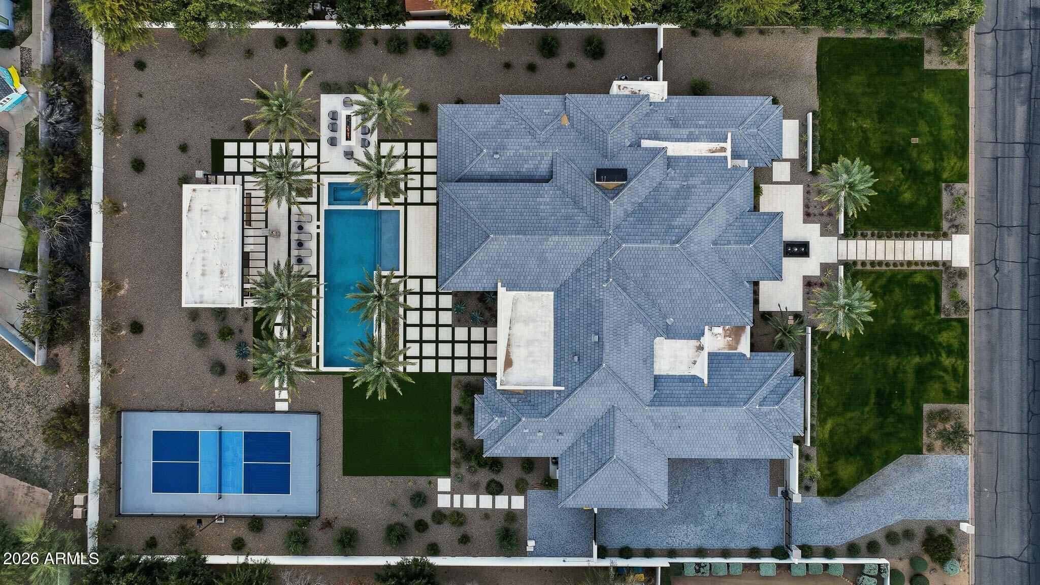5102 East Butler Drive Paradise Valley, AZ 85253 - Photo 110 of 111 an aerial view of a house with a yard and potted plants