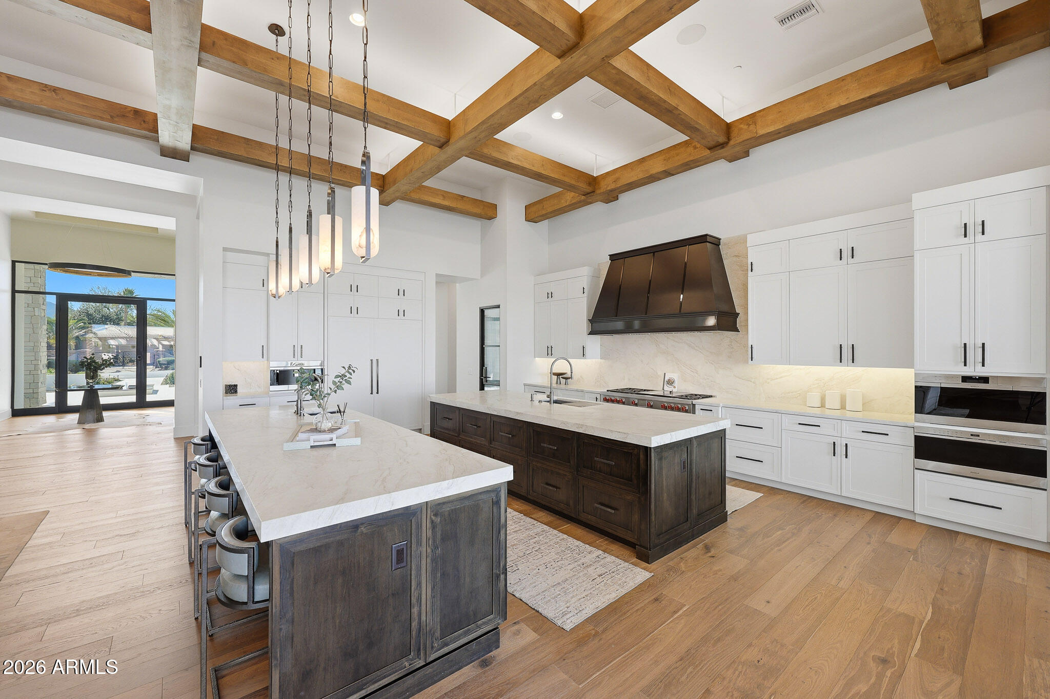 5102 East Butler Drive Paradise Valley, AZ 85253 - Photo 12 of 111 a kitchen with a stove and a sink
