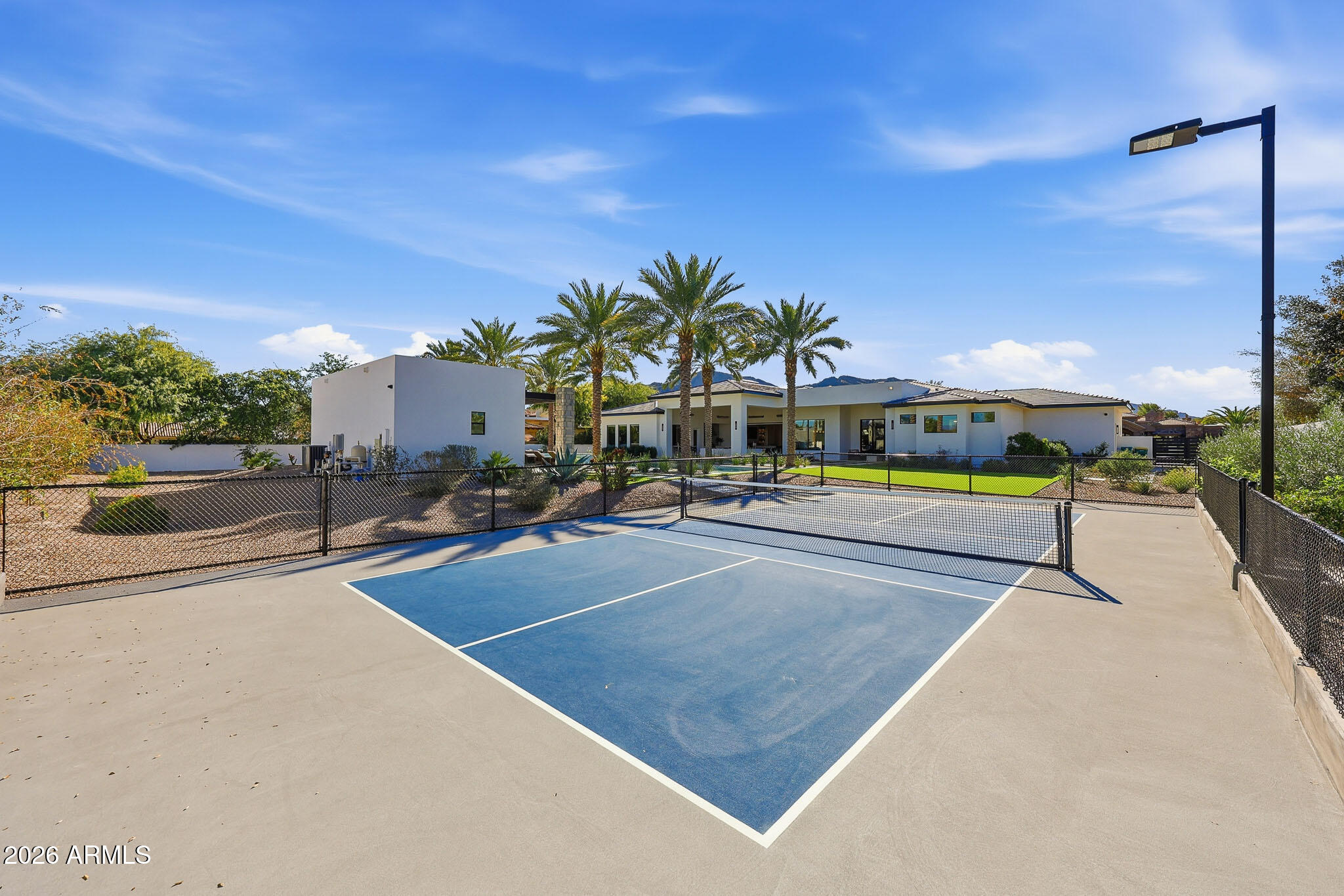 5102 East Butler Drive Paradise Valley, AZ 85253 - Photo 36 of 111 a view of a swimming pool and front of house