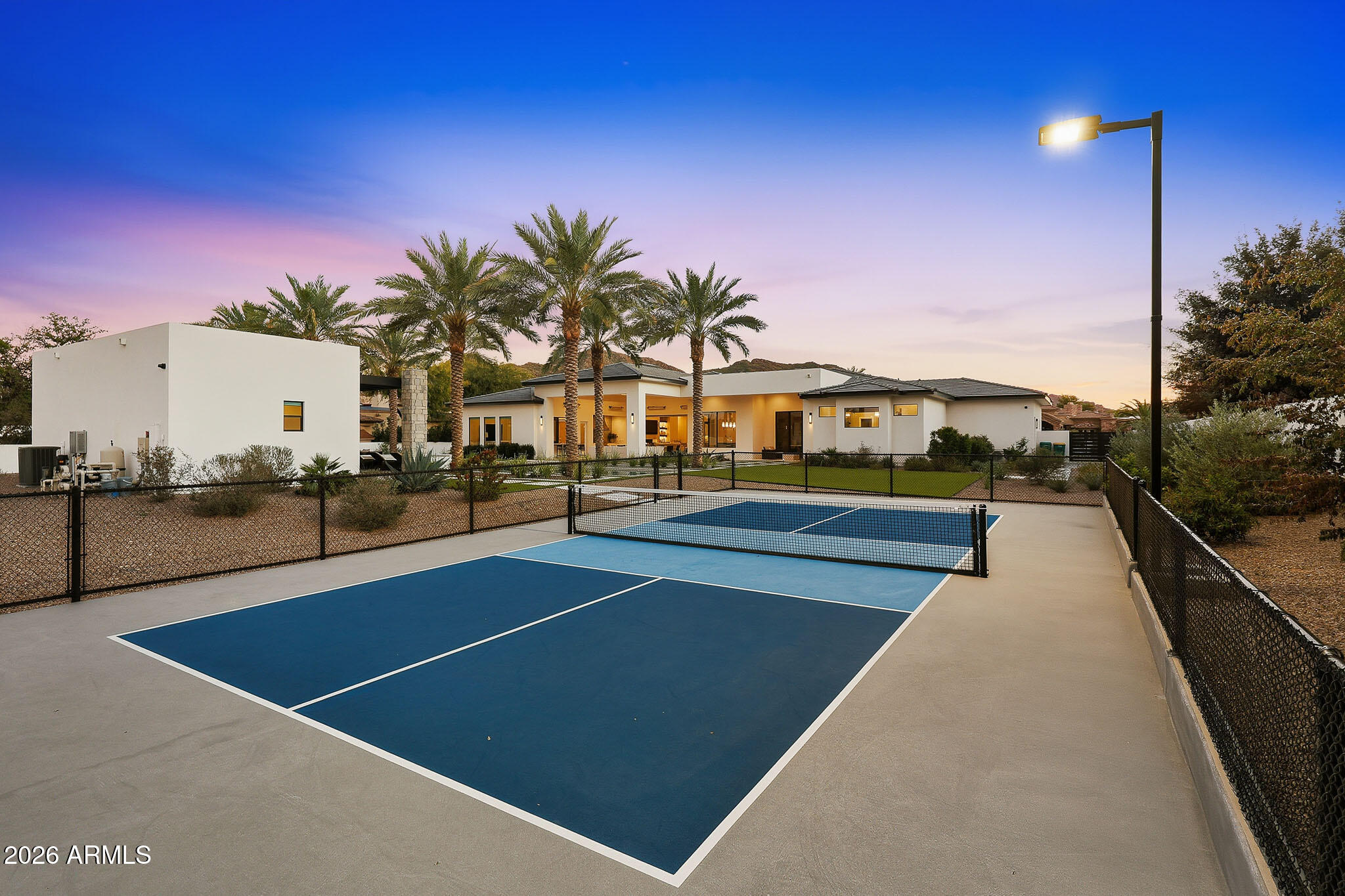 5102 East Butler Drive Paradise Valley, AZ 85253 - Photo 45 of 111 a view of swimming pool with outdoor seating and a pathway