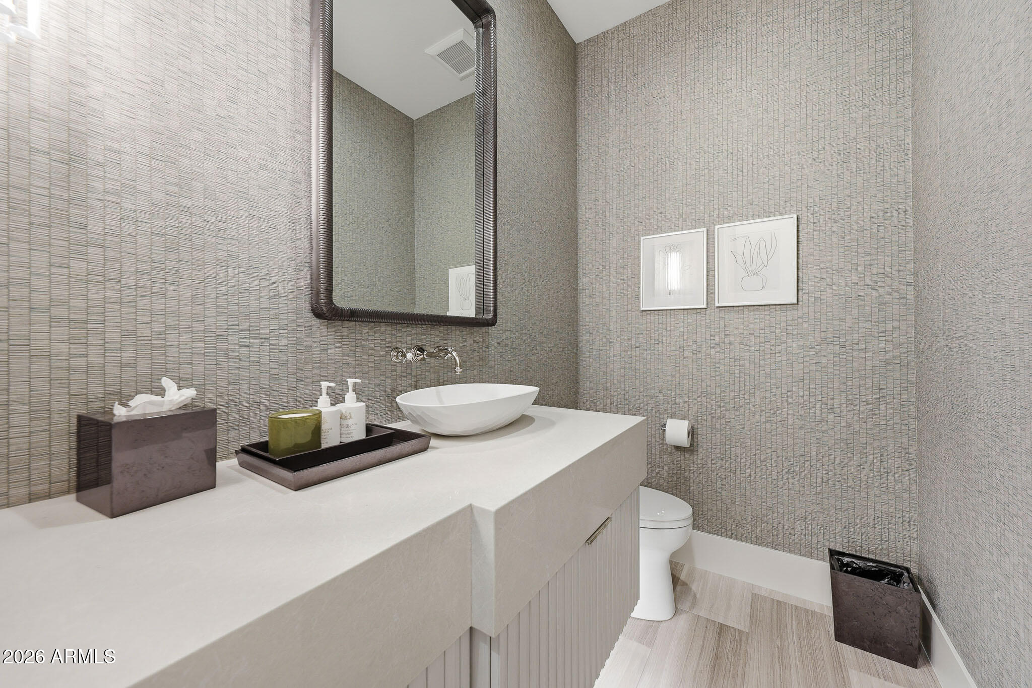 5102 East Butler Drive Paradise Valley, AZ 85253 - Photo 68 of 111 a bathroom with a toilet sink and mirror