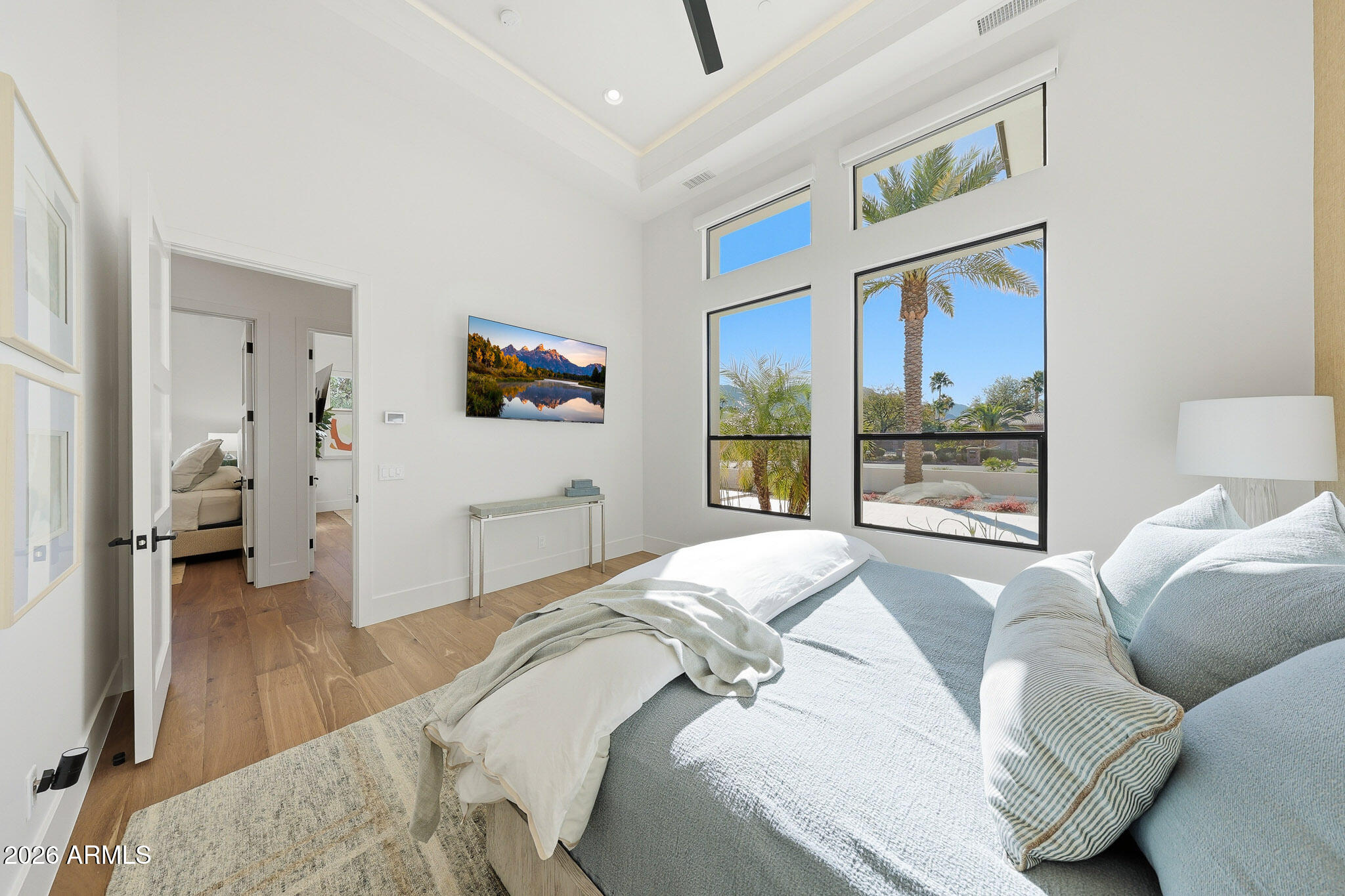 5102 East Butler Drive Paradise Valley, AZ 85253 - Photo 70 of 111 a bedroom with a bed couch and a window