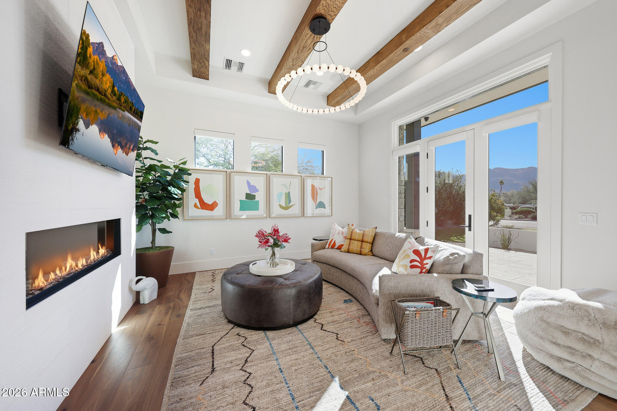 5102 East Butler Drive Paradise Valley, AZ 85253 - Photo 72 of 111 a living room with furniture and a fireplace