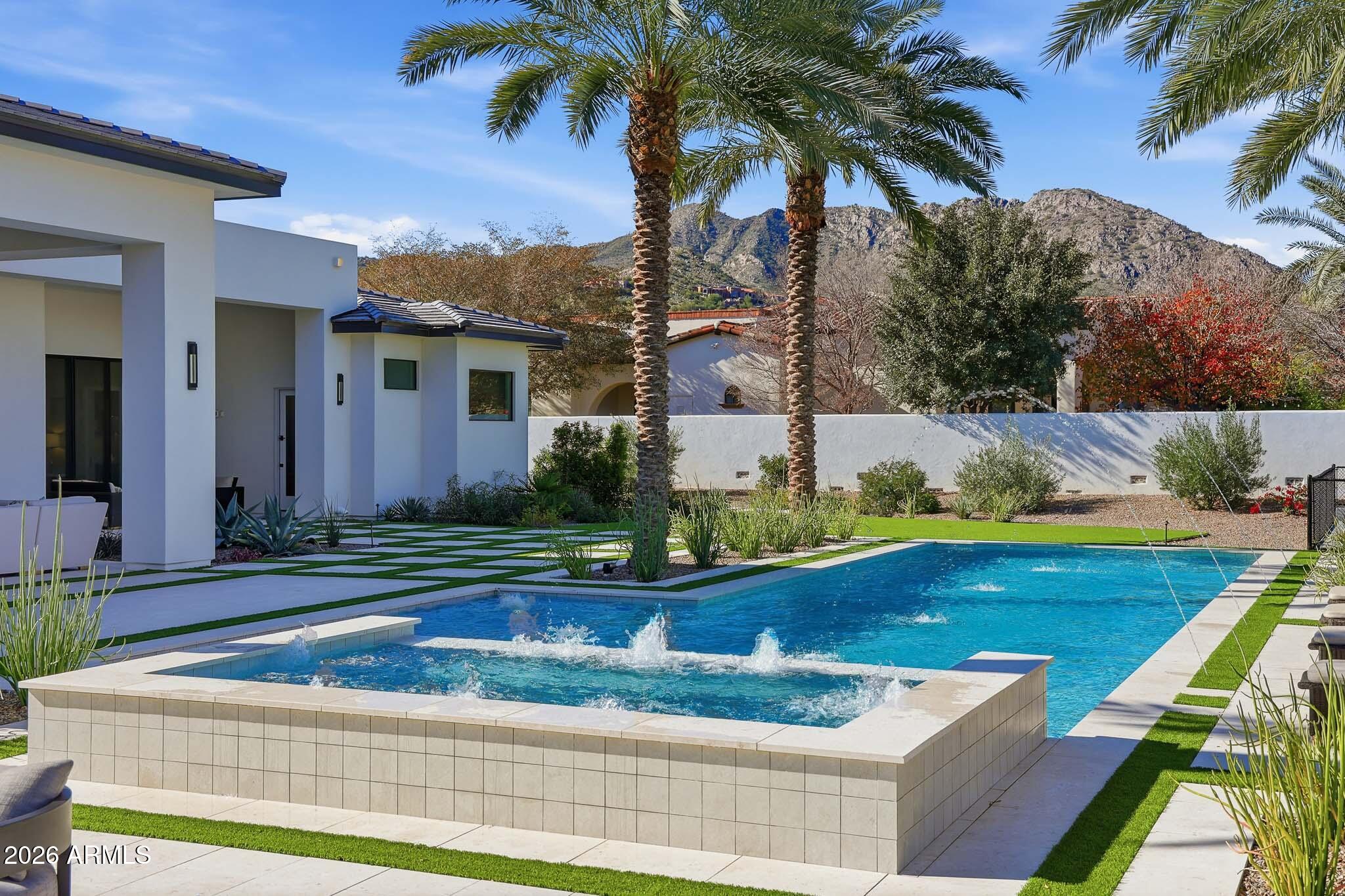 5102 East Butler Drive Paradise Valley, AZ 85253 - Photo 92 of 111 a view of a house with pool and a yard