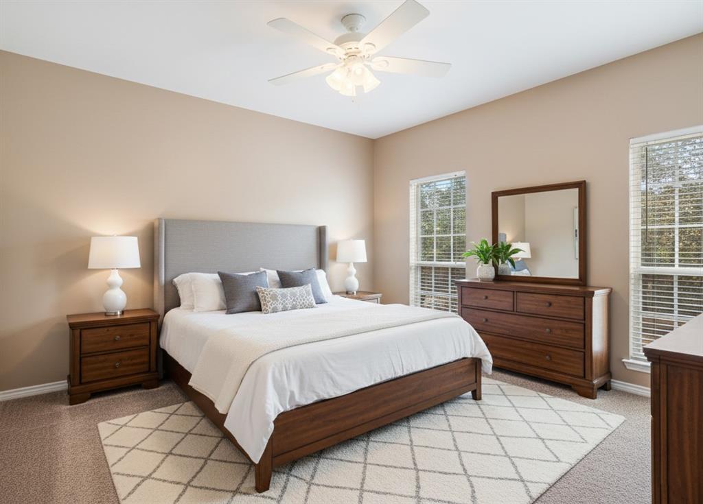 126 Hidden Lake Drive Powderly, TX 75473 - Photo 15 of 29 a bedroom with a bed and a window