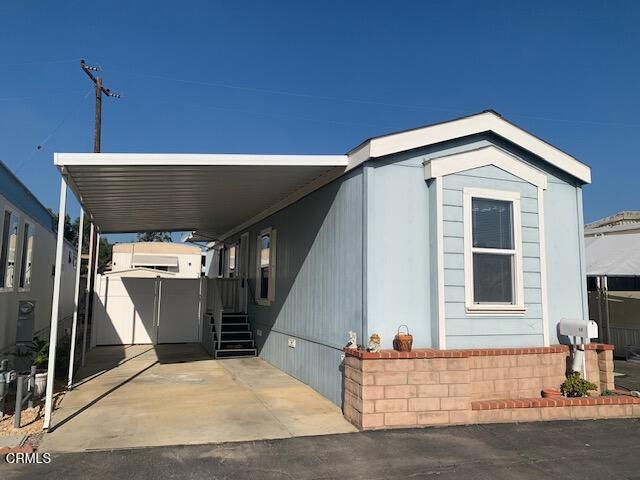 a view of a house with a patio