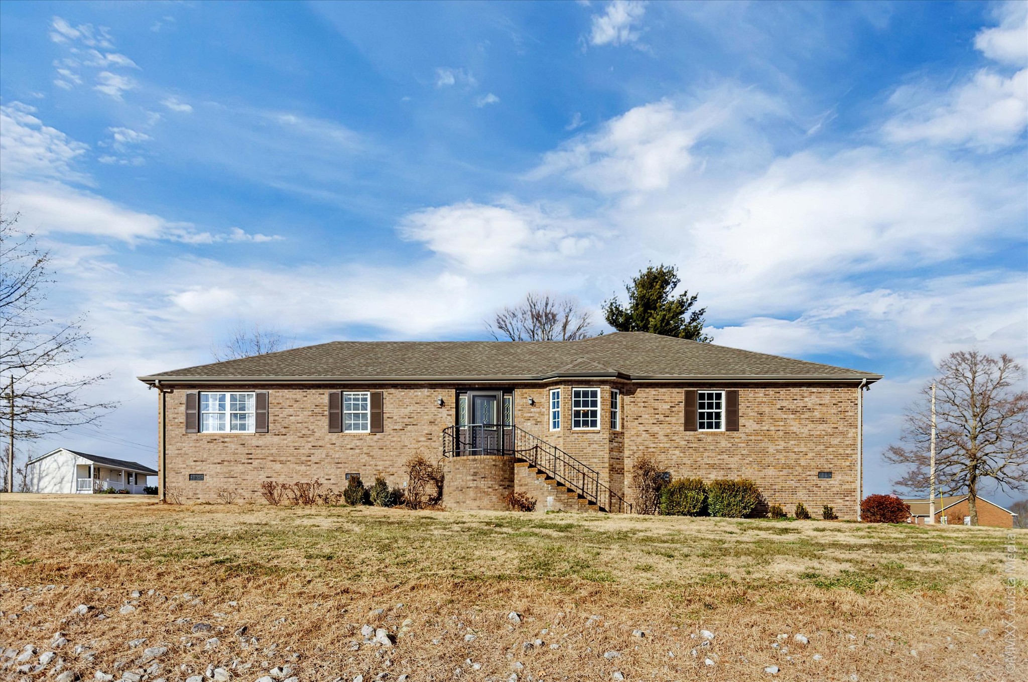 800 Blakemore Road Dickson, TN 37055 - Photo 1 of 28 a front view of a house with a garden