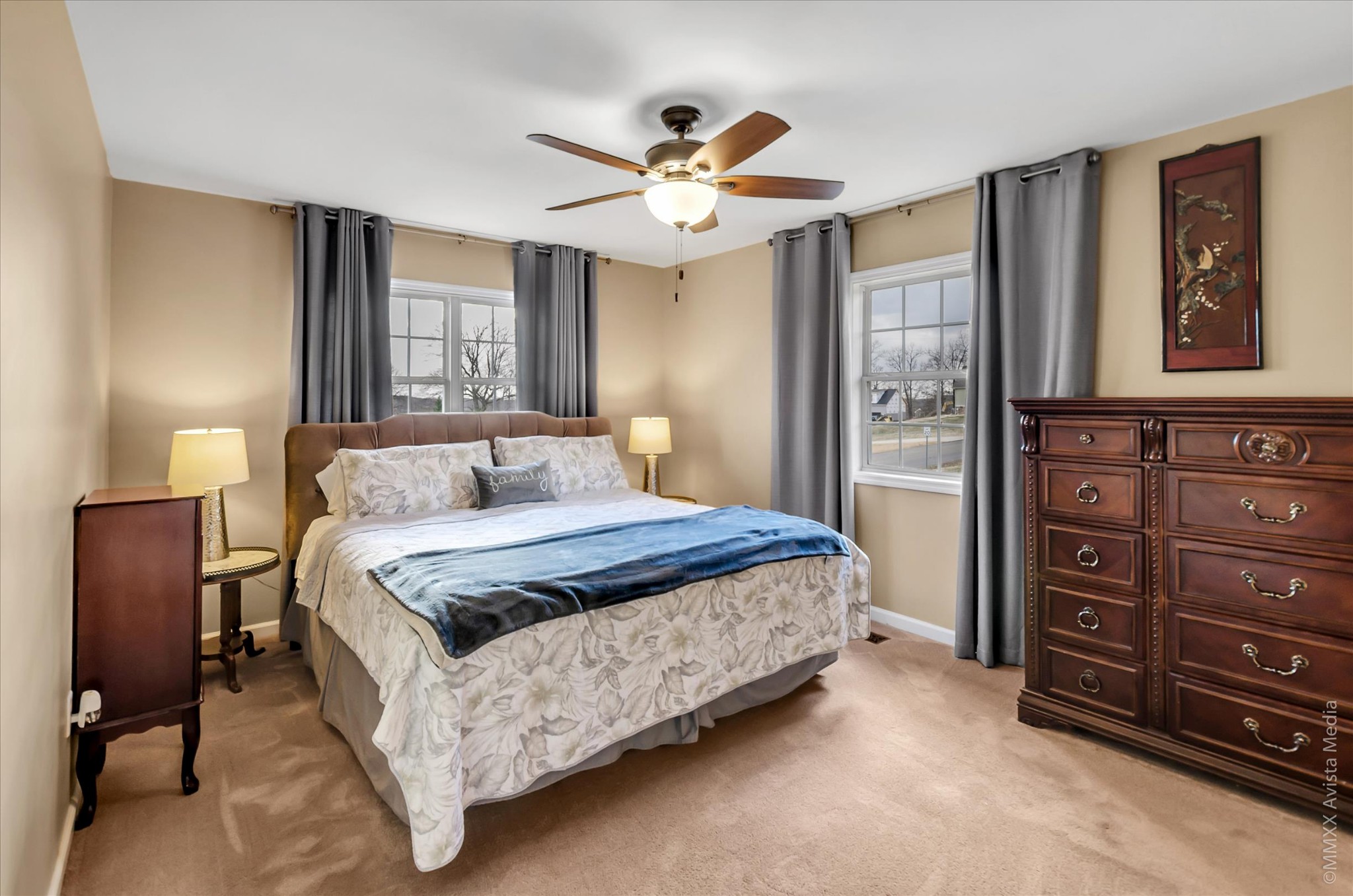 800 Blakemore Road Dickson, TN 37055 - Photo 20 of 28 a bedroom with a bed and a chandelier
