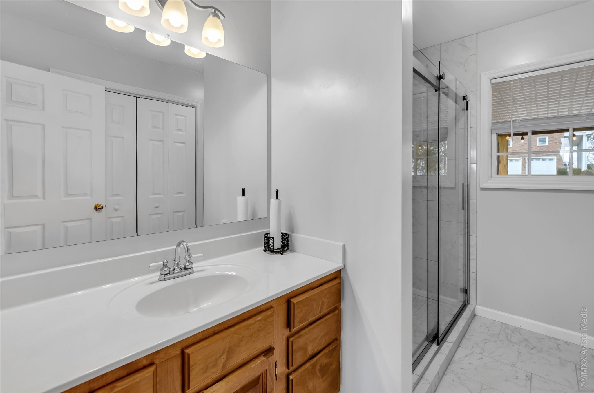 800 Blakemore Road Dickson, TN 37055 - Photo 21 of 28 a bathroom with a sink double vanity and a mirror