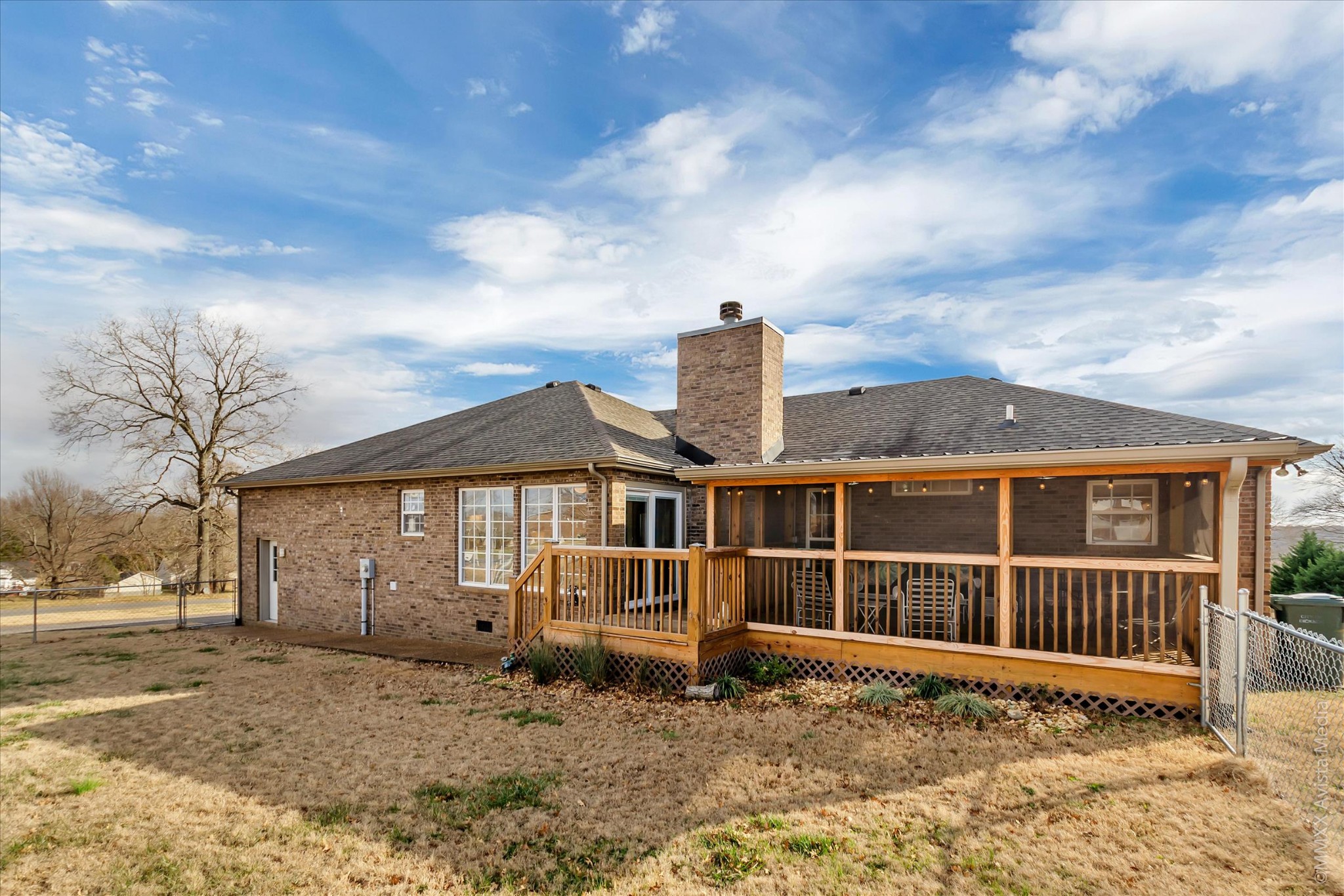 800 Blakemore Road Dickson, TN 37055 - Photo 4 of 28 a view of a house with a roof deck