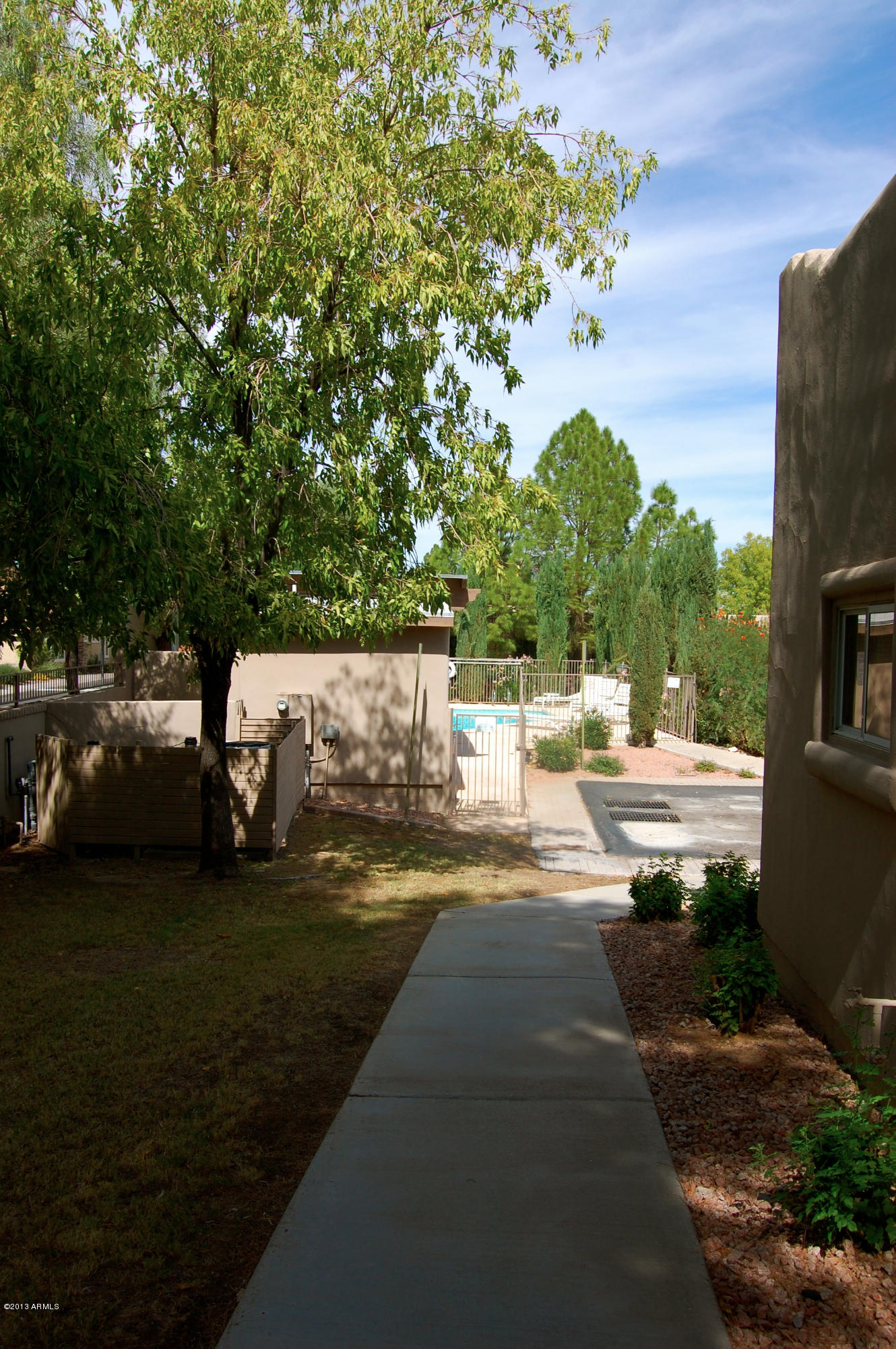 5445 East McKellips Road, Unit 28 Mesa, AZ 85215 - Photo 37 of 40 View from front door to pool