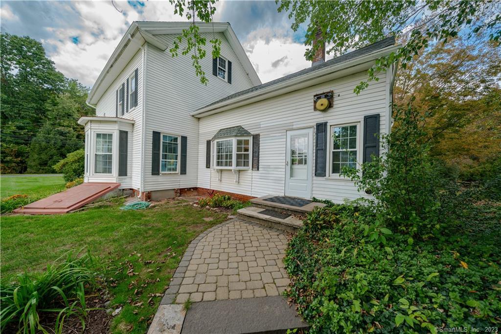 a house view with a garden space