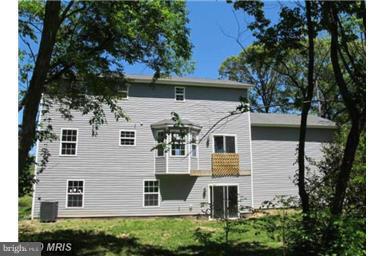 159 Cove Point Road Lusby, MD 20657 - Photo 3 of 26 Exterior (Rear)