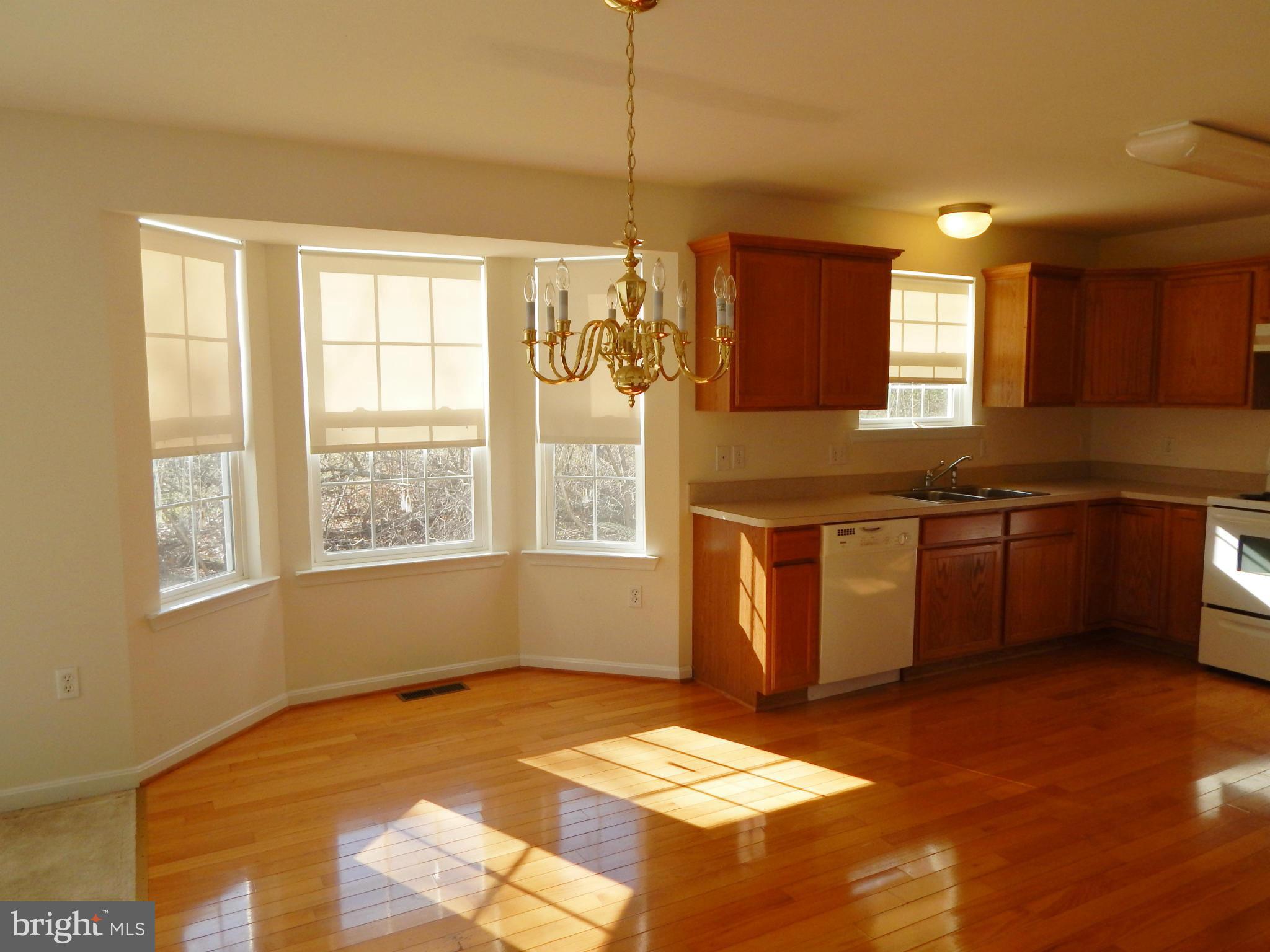 159 Cove Point Road Lusby, MD 20657 - Photo 10 of 26 eat in area with bay view window