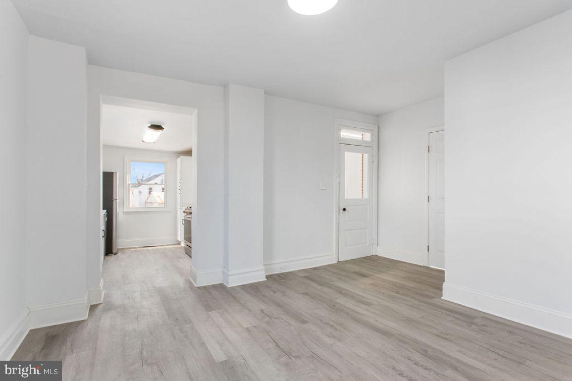 3 Sprenkle Avenue Hanover, PA 17331 - Photo 6 of 28 a view of a hallway with wooden floor and a bathroom