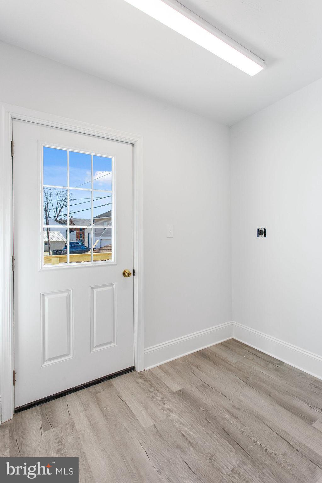 3 Sprenkle Avenue Hanover, PA 17331 - Photo 10 of 28 a view of an empty room with wooden floor and cabinet