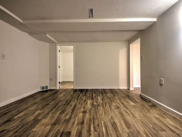 a view of an empty room and window