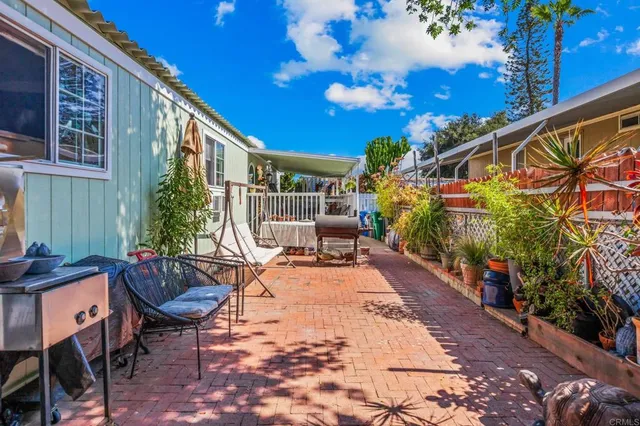 a view of yard with patio