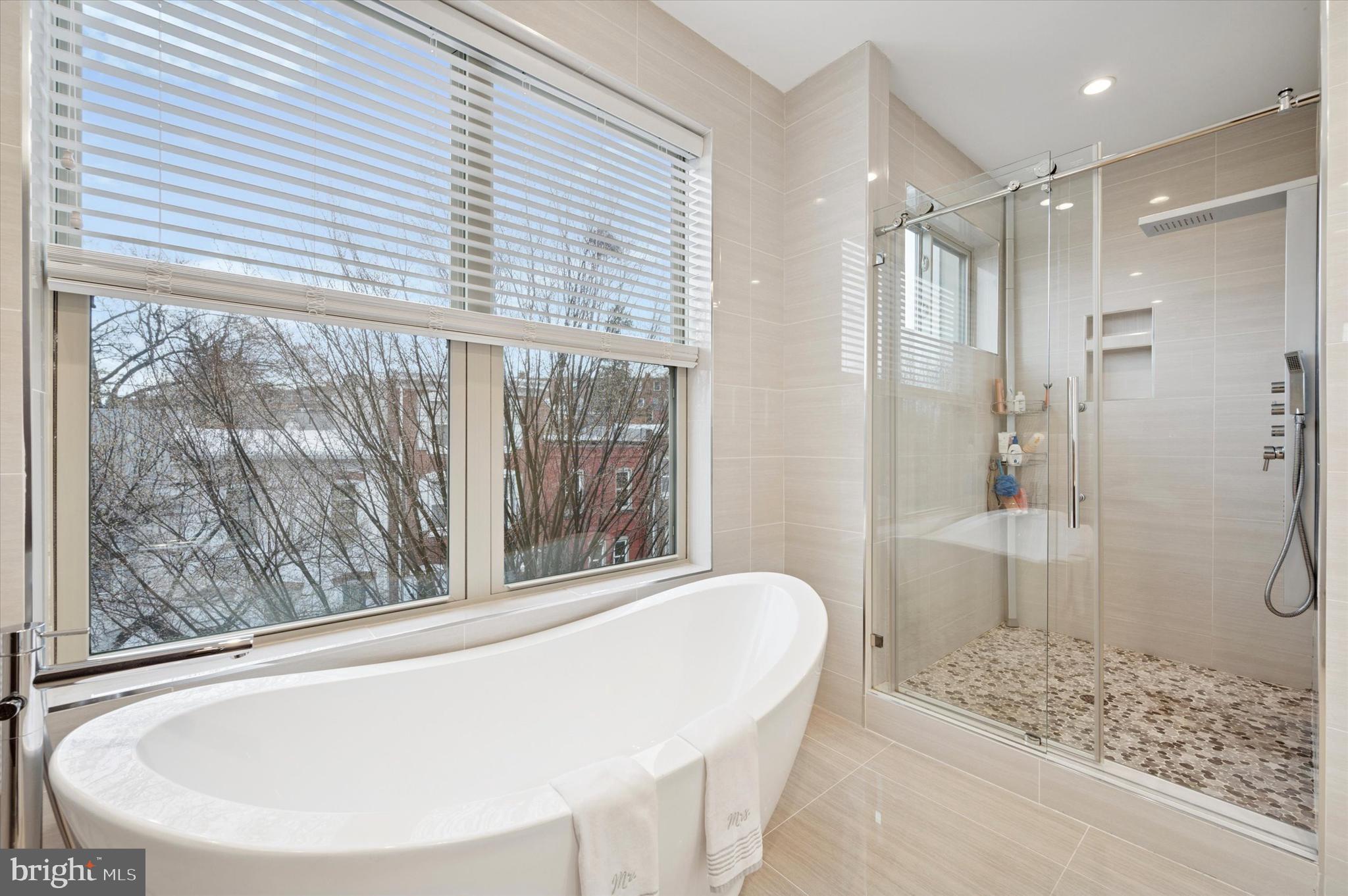 152 Kalos Street Philadelphia, PA 19128 - Photo 20 of 26 a bathroom with a tub and shower