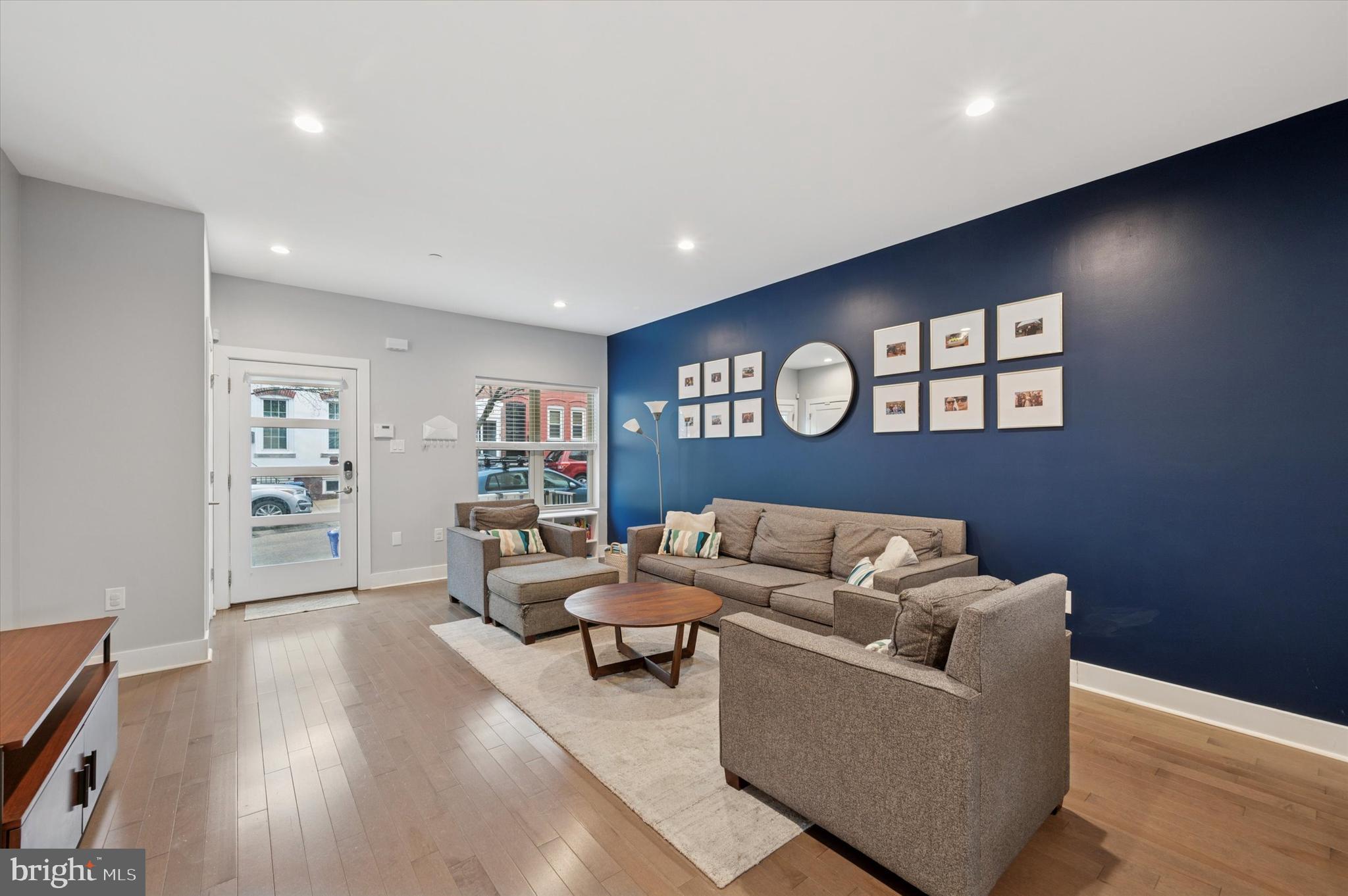 152 Kalos Street Philadelphia, PA 19128 - Photo 3 of 26 a living room with furniture and a wooden floor