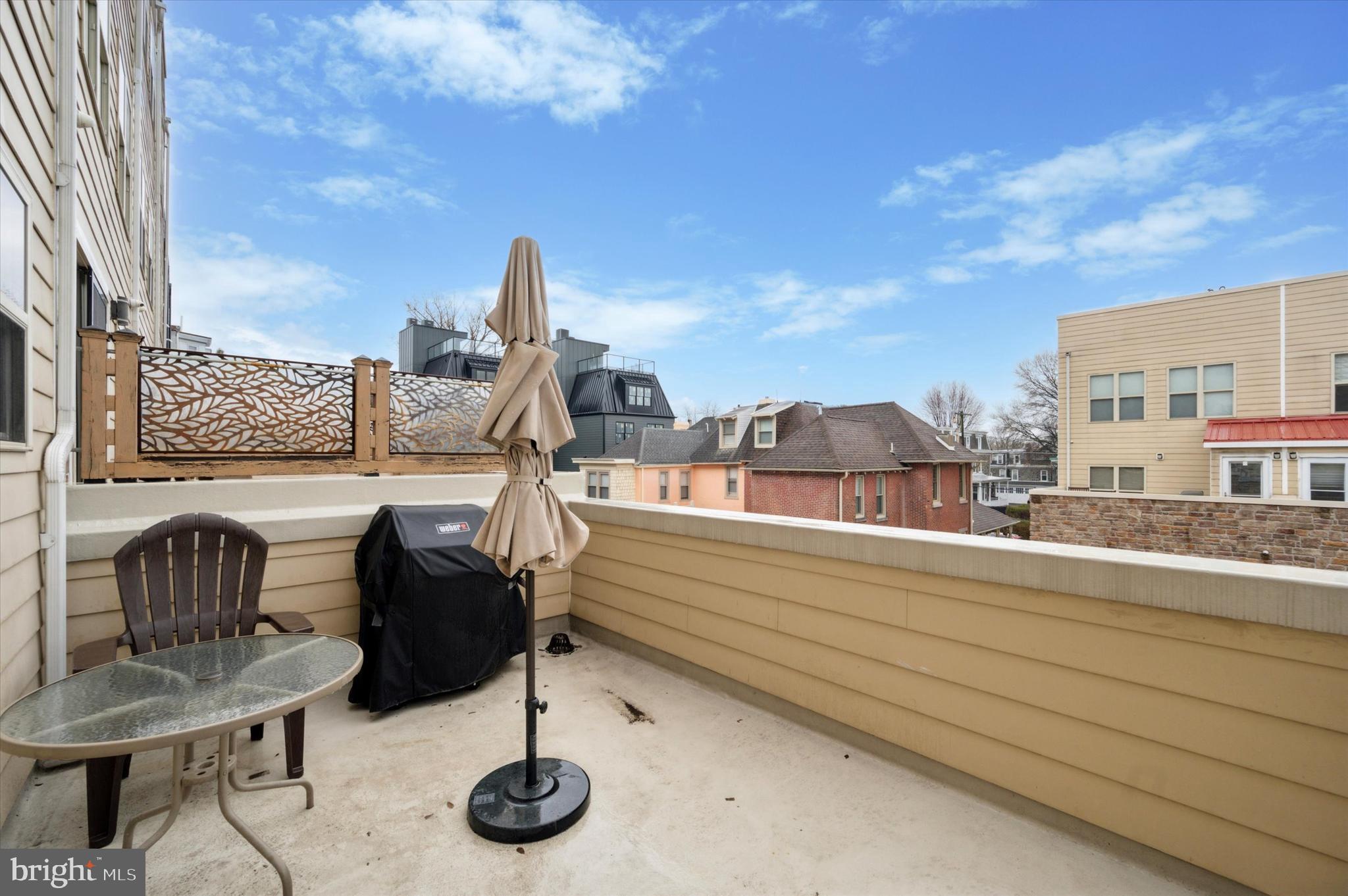 152 Kalos Street Philadelphia, PA 19128 - Photo 10 of 26 a view of roof deck with patio and barbeque grill