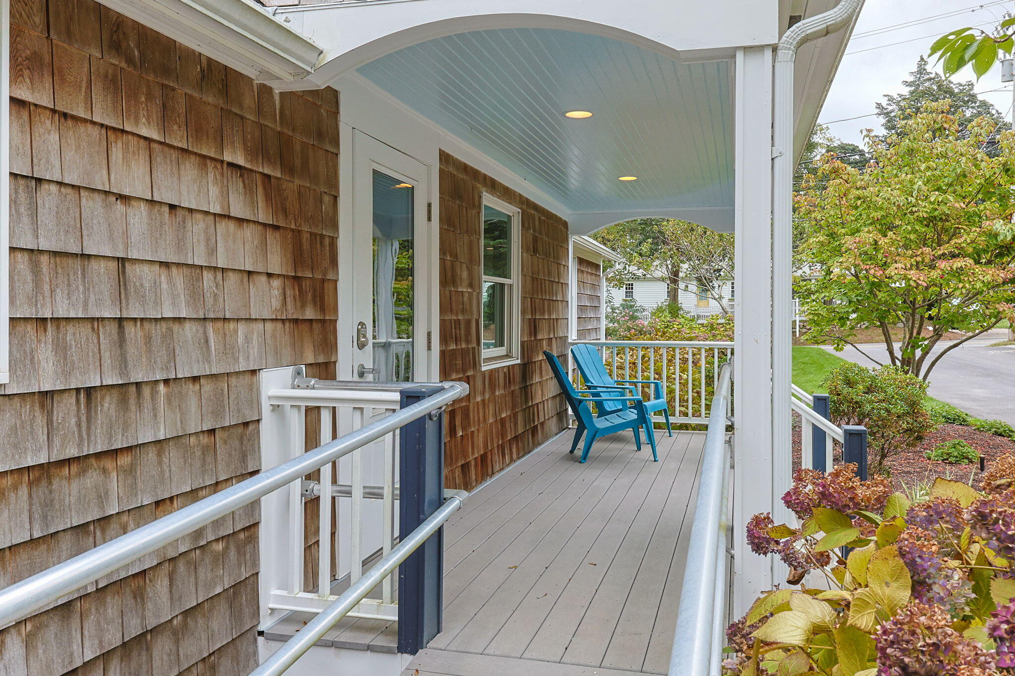 29 West Road Orleans, MA 02653 - Photo 6 of 27 a balcony with furniture and a potted plant