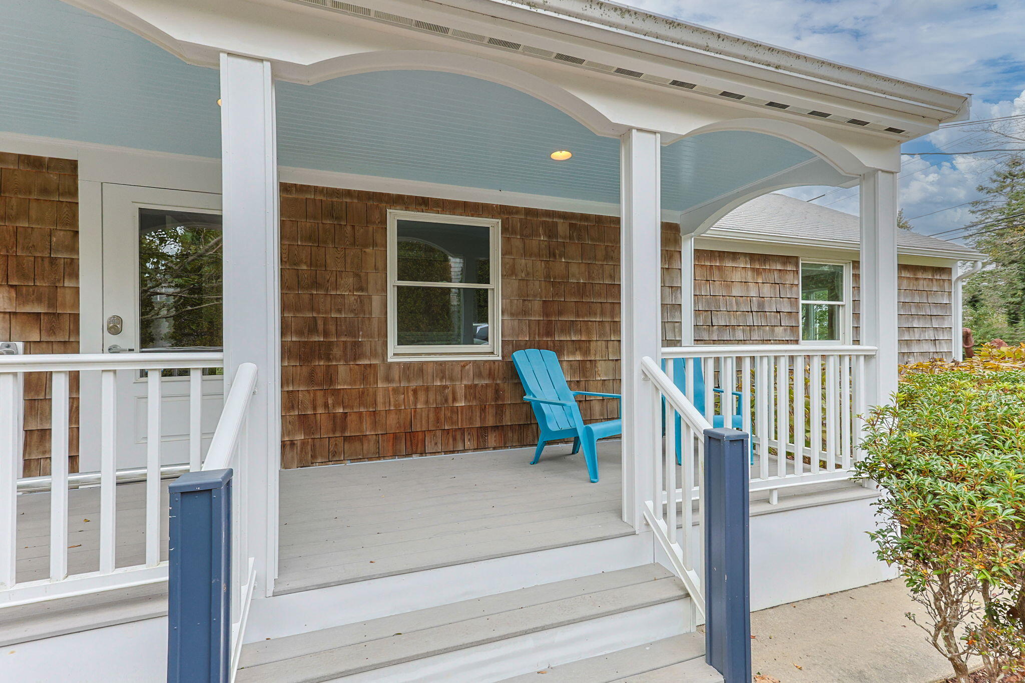 29 West Road Orleans, MA 02653 - Photo 7 of 27 front view of a house with a porch