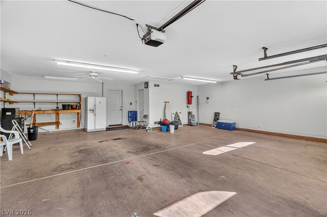 2055 Cholla Way Laughlin, NV 89029 - Photo 46 of 87 Ample space for vehicles and storage with convenient access and overhead lighting.