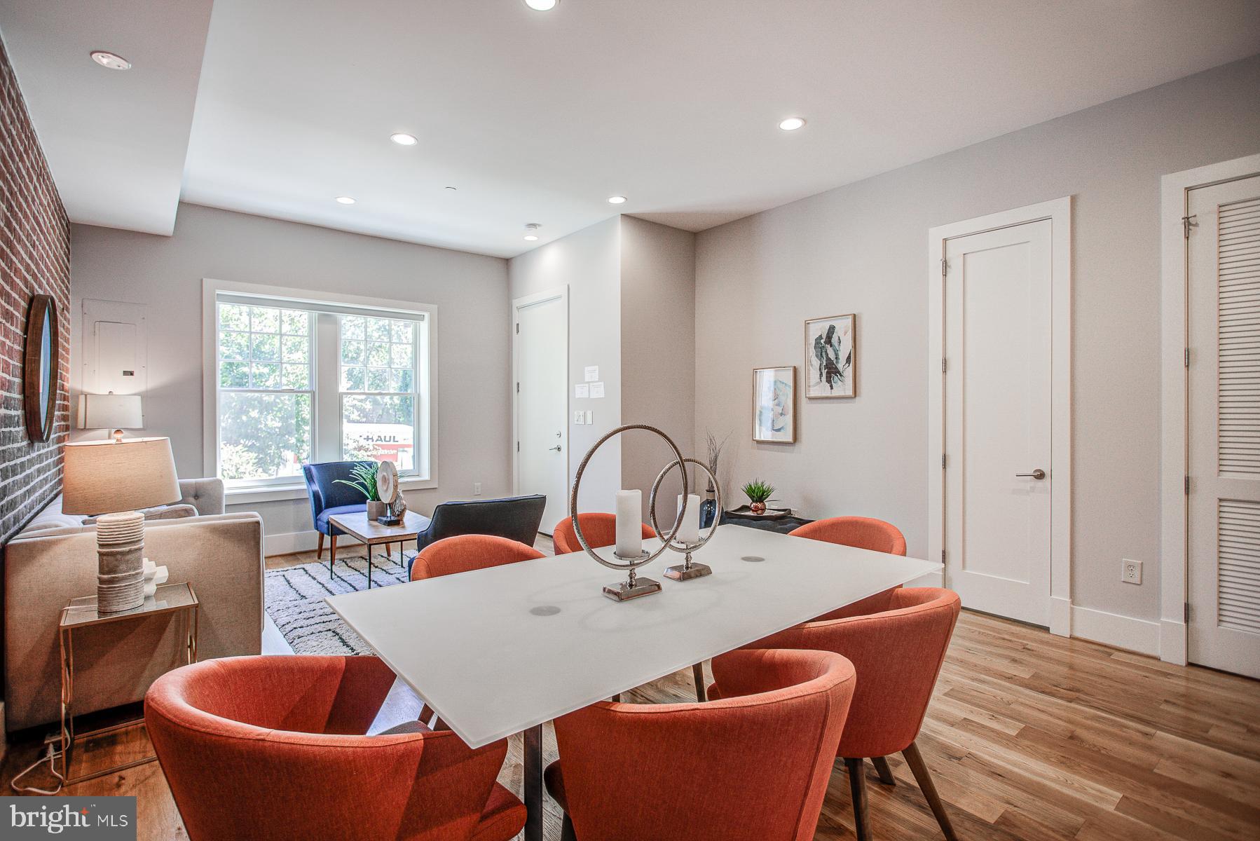 2024 16th Street Northwest, Unit C Washington, DC 20009 - Photo 6 of 27 a view of a dining room with furniture and window