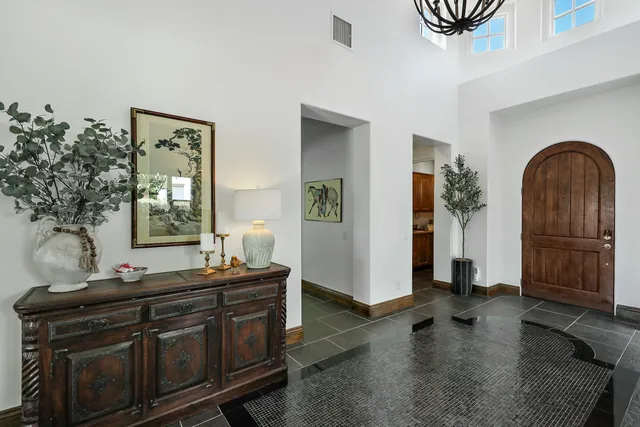 a view of living room with furniture and wooden floor