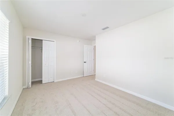 a view of an empty walk in closet