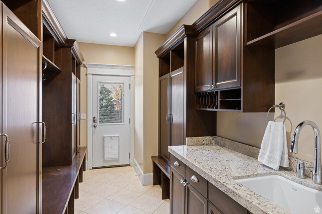 1263 Chapman Court Alpine, UT 84004 - Photo 59 of 83 Laundry room with a sink and light tile patterned floors