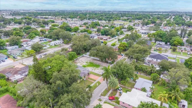 an aerial view of residential house with outdoor space