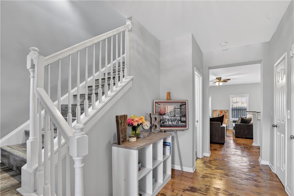 2555 Flat Shoals Road, Unit 1304 Atlanta, GA 30349 - Photo 2 of 27 a view of entryway livingroom and hallway with wooden floor