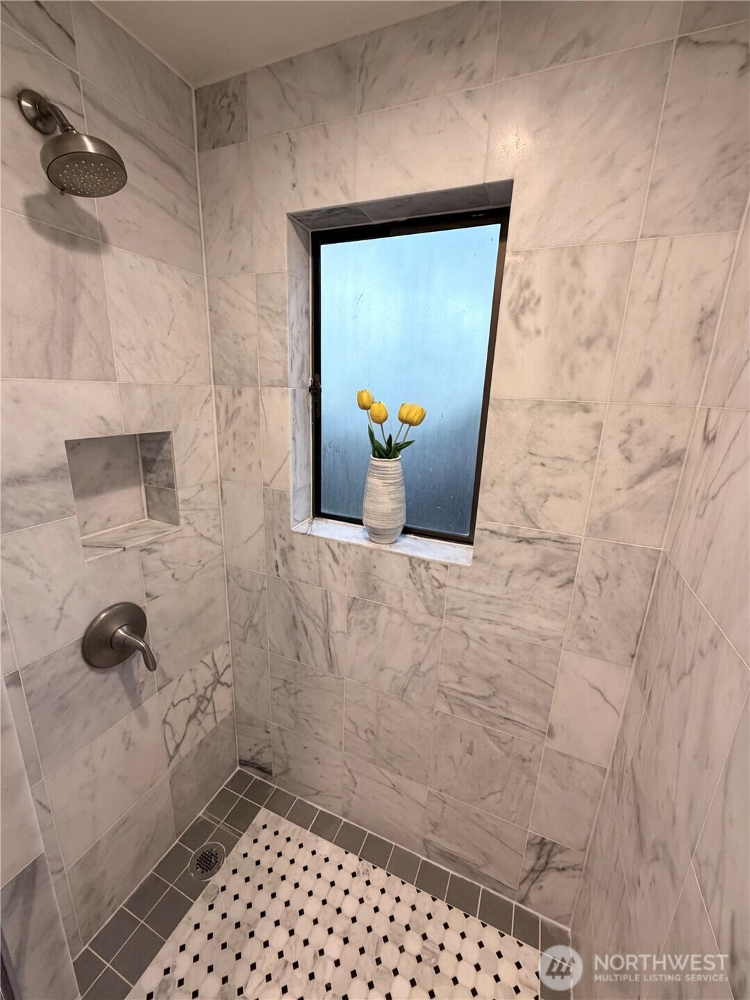 3217 East Madison Street Seattle, WA 98112 - Photo 11 of 40 a bathroom with a shower