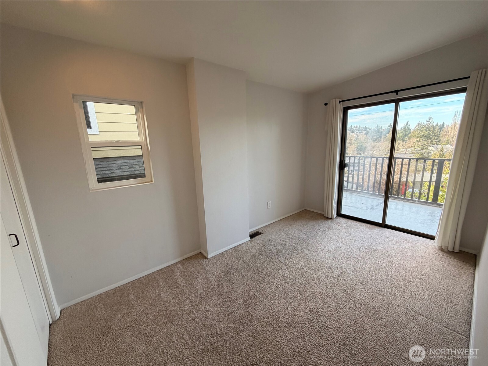 3217 East Madison Street Seattle, WA 98112 - Photo 22 of 40 a view of an empty room with windows